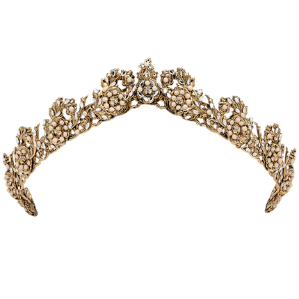 Gold tiara with floral designs on a white background