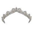 Silver tiara with floral and bead details on a white background