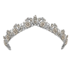 Silver tiara with floral and bead details on a white background